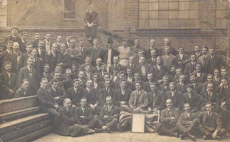 A group photo of the entire work force, from around 1900.